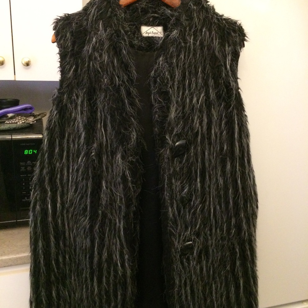 Angela Bucars collection, L faux fur, fully lined vest 2 button closure